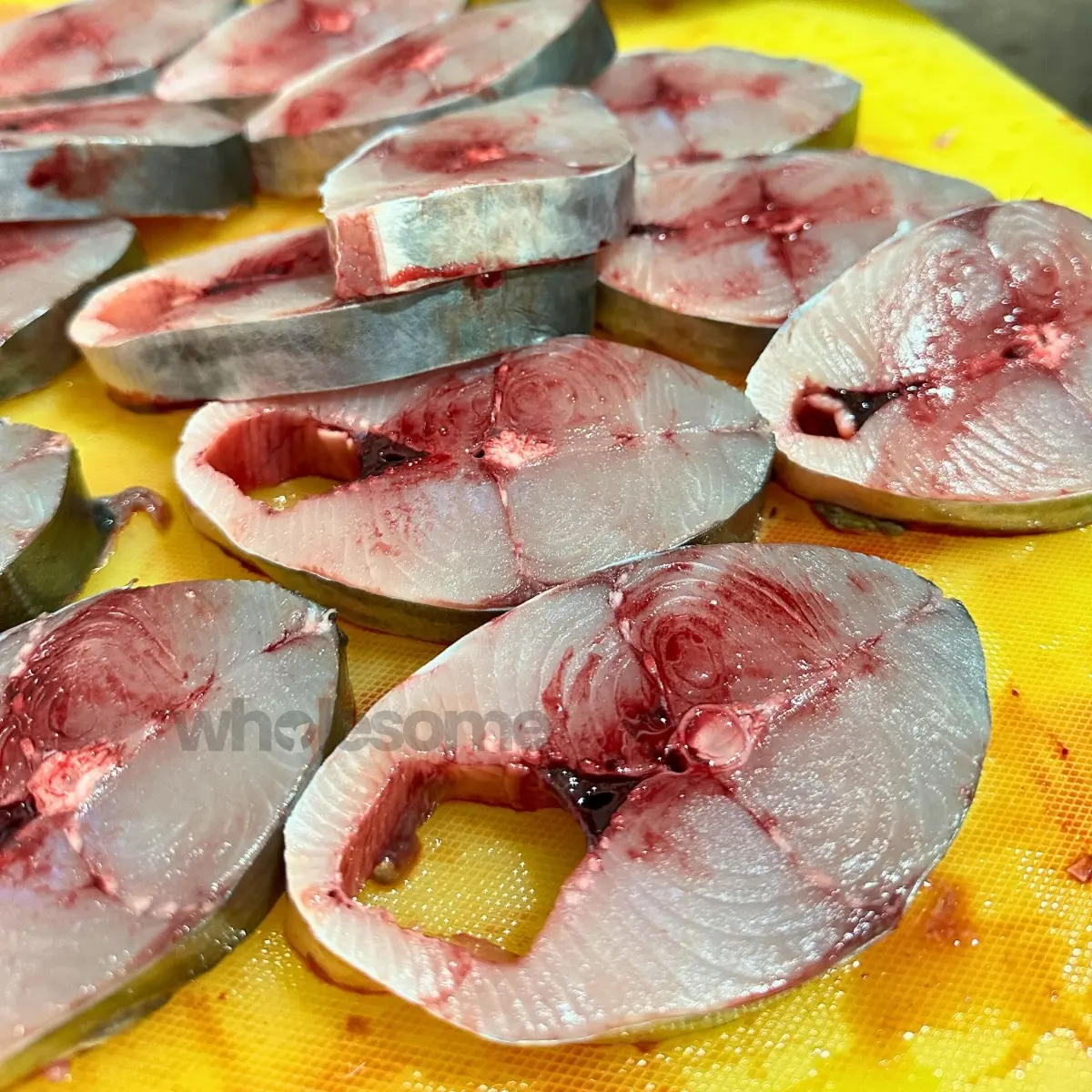 Kingfish (Surmai) slices freshly cut on hygienic board at Wholesome Seafood